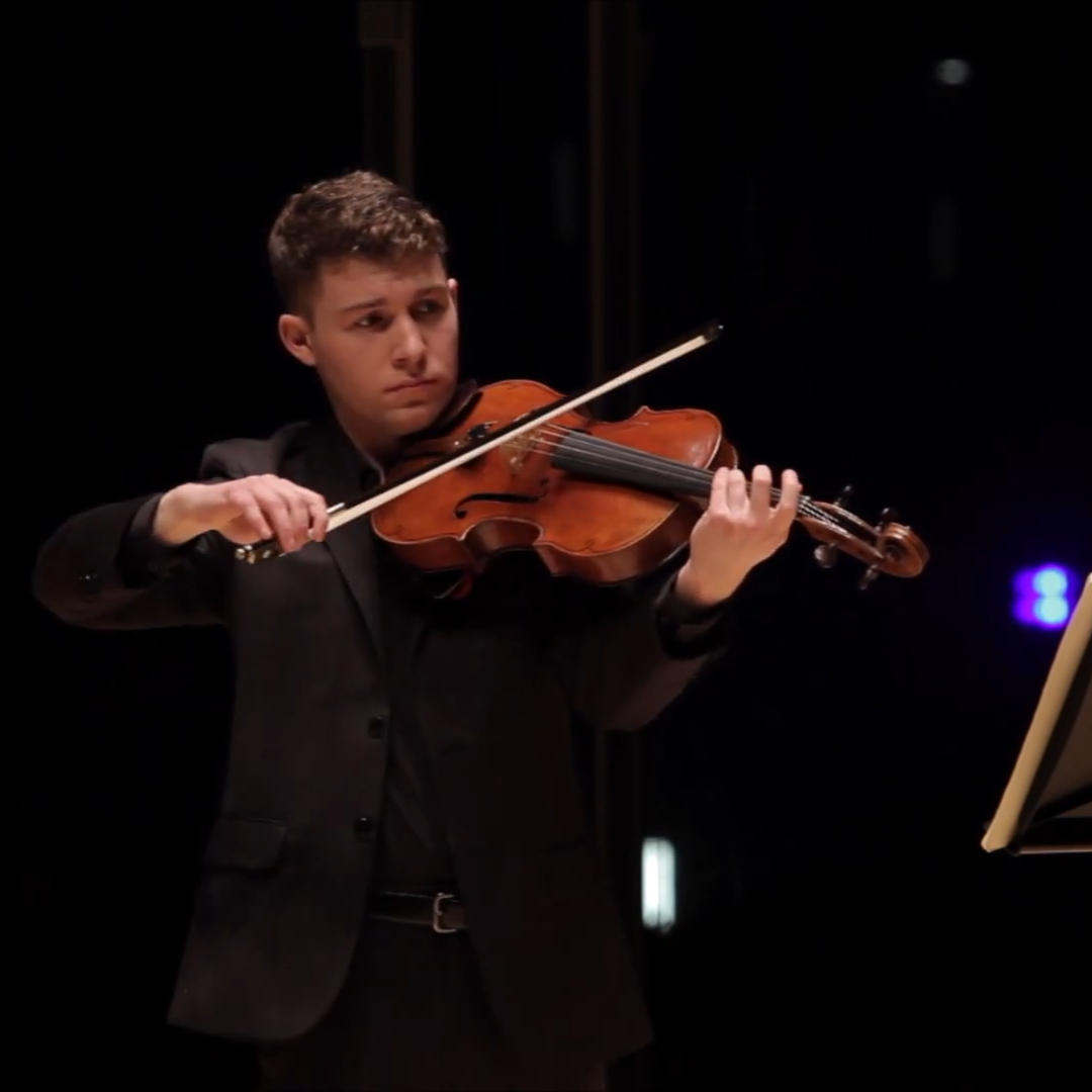 Seth performing in his recital.